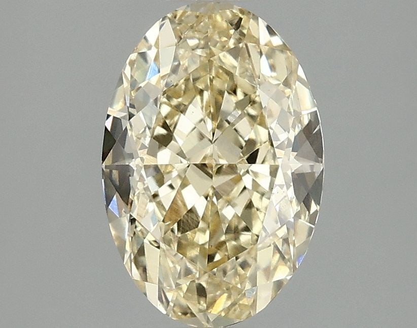 Loose Diamond - OVAL 2.05ct Fancy Vivid Yellow VS2: Loose Diamond - OVAL 2.05ct Fancy Vivid Yellow VS2 Source: This is a real non-mined Diamond that has been grown in a lab Shape: OVAL Carats: 2.05 Color: Fancy Vivid Yellow Certification: IGI Video: