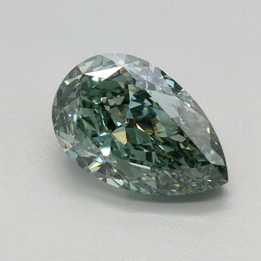 Loose Diamond - PEAR 1.12ct Fancy Vivid Green VS1: Loose Diamond - PEAR 1.12ct Fancy Vivid Green VS1 Source: This is a real non-mined Diamond that has been grown in a lab Shape: PEAR Carats: 1.12 Color: Fancy Vivid Green Certification: IGI Video: