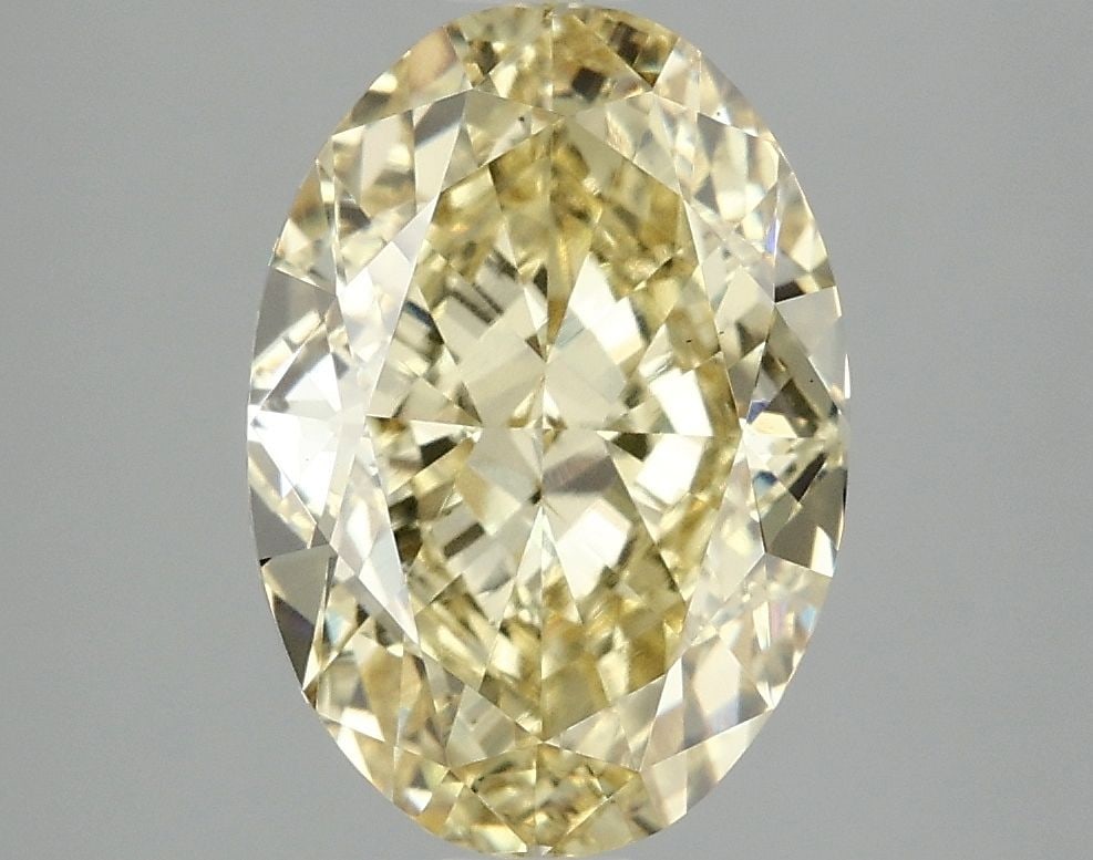 Loose Diamond - OVAL 4.1ct Fancy Vivid Yellow VS1: Loose Diamond - OVAL 4.1ct Fancy Vivid Yellow VS1 Source: This is a real non-mined Diamond that has been grown in a lab Shape: OVAL Carats: 4.1 Color: Fancy Vivid Yellow Certification: IGI Video:
