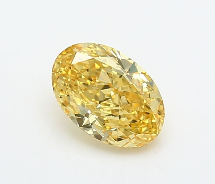 Loose Diamond - OVAL 1.01ct Fancy Vivid Yellow VVS2: Loose Diamond - OVAL 1.01ct Fancy Vivid Yellow VVS2 Source: This is a real non-mined Diamond that has been grown in a lab Shape: OVAL Carats: 1.01 Color: Fancy Vivid Yellow Certification: IGI Video: