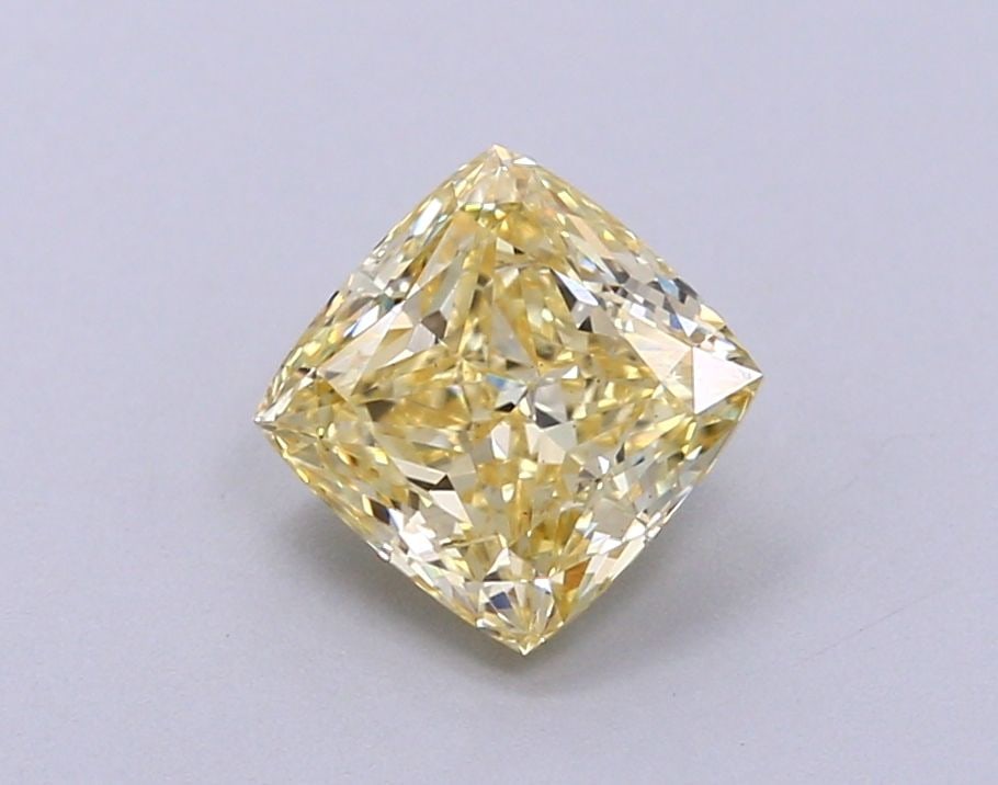 Loose Diamond - CUSHION MODIFIED 1.01ct Fancy Yellow VS2: Loose Diamond - CUSHION MODIFIED 1.01ct Fancy Yellow VS2 Source: This is a real non-mined Diamond that has been grown in a lab Shape: CUSHION MODIFIED Carats: 1.01 Color: Fancy Yellow Certification: I