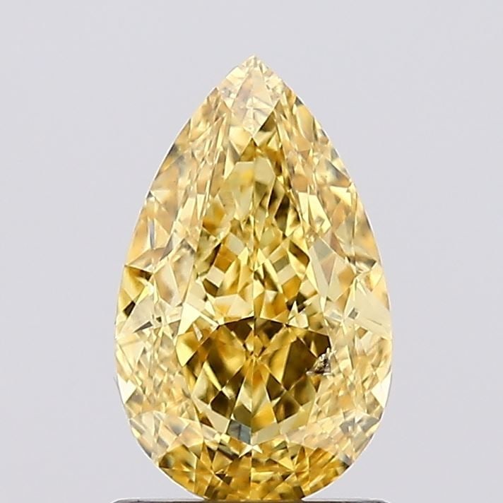 Loose Diamond - PEAR 1.32ct Fancy Vivid Yellow VS2: Loose Diamond - PEAR 1.32ct Fancy Vivid Yellow VS2 Source: This is a real non-mined Diamond that has been grown in a lab Shape: PEAR Carats: 1.32 Color: Fancy Vivid Yellow Certification: IGI Video: