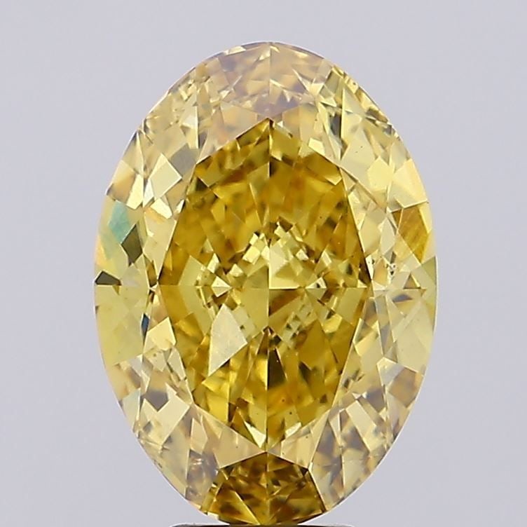 Loose Diamond - OVAL 8.0ct Fancy Vivid Brownish Yellow VS2: Loose Diamond - OVAL 8.0ct Fancy Vivid Brownish Yellow VS2 Source: This is a real non-mined Diamond that has been grown in a lab Shape: OVAL Carats: 8.0 Color: Fancy Vivid Brownish Yellow Certificatio