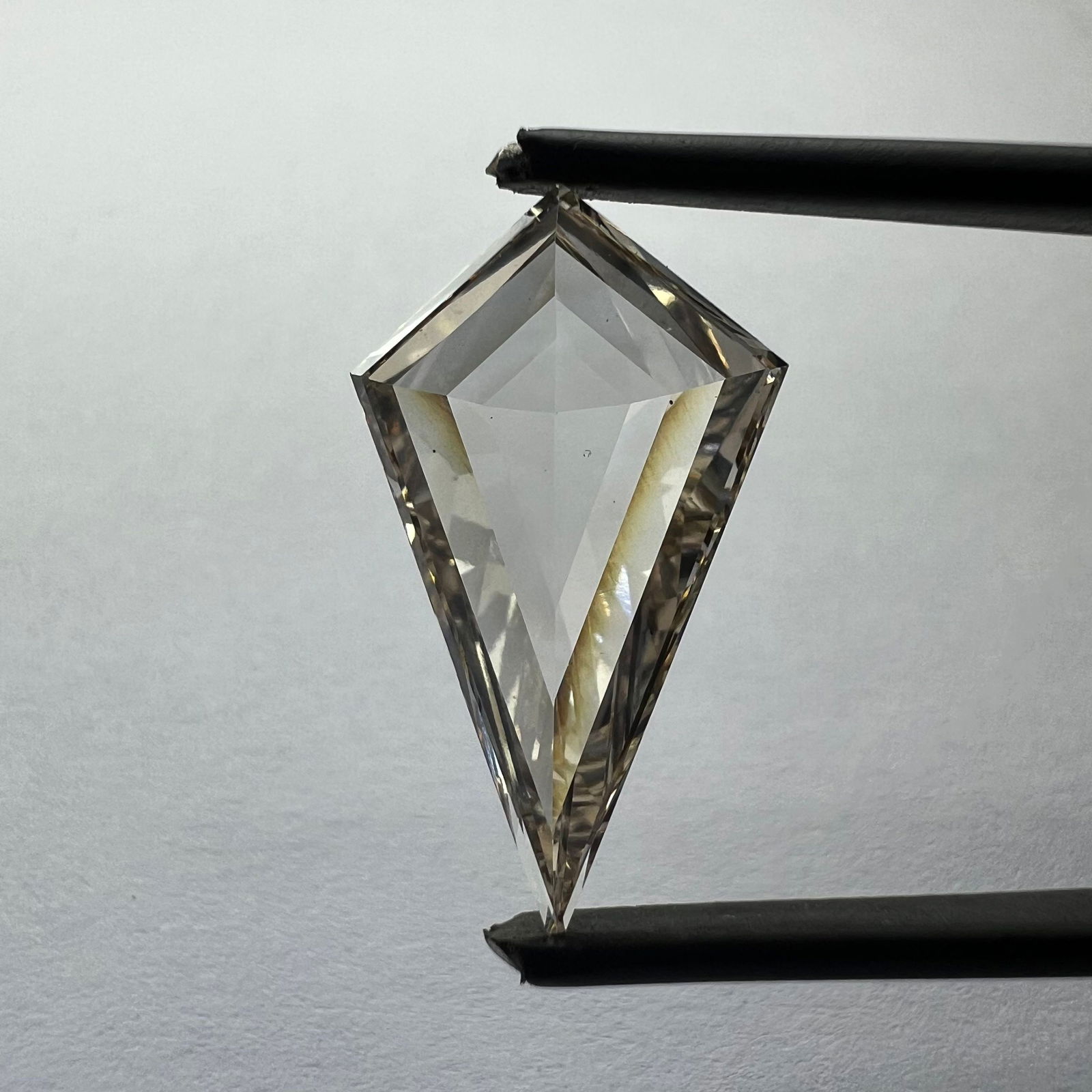 Loose Diamond - KITE 4.05ct Orange VS2: Loose Diamond - KITE 4.05ct Orange VS2 Source: This is a real non-mined Diamond that has been grown in a lab Shape: KITE Carats: 4.05 Color: Orange Certification: NONE Additional images available upon