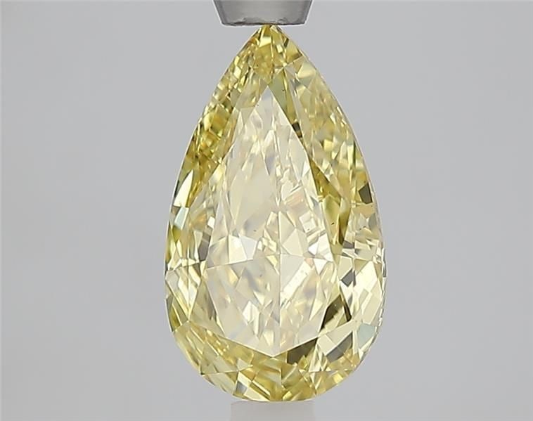 Loose Diamond - PEAR 1.6ct Fancy Vivid Yellow VS1: Loose Diamond - PEAR 1.6ct Fancy Vivid Yellow VS1 Source: This is a real non-mined Diamond that has been grown in a lab Shape: PEAR Carats: 1.6 Color: Fancy Vivid Yellow Certification: IGI Video: