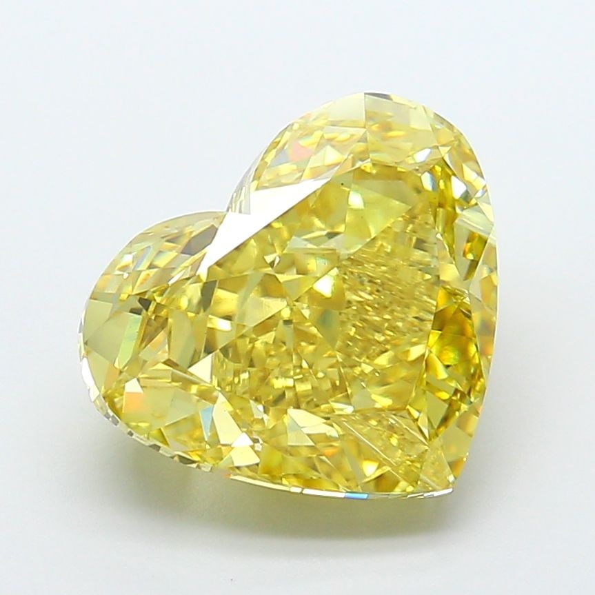 Loose Diamond - HEART 8.71ct Fancy Vivid Yellow VS1: Loose Diamond - HEART 8.71ct Fancy Vivid Yellow VS1 Source: This is a real non-mined Diamond that has been grown in a lab Shape: HEART Carats: 8.71 Color: Fancy Vivid Yellow Certification: IGI Video: