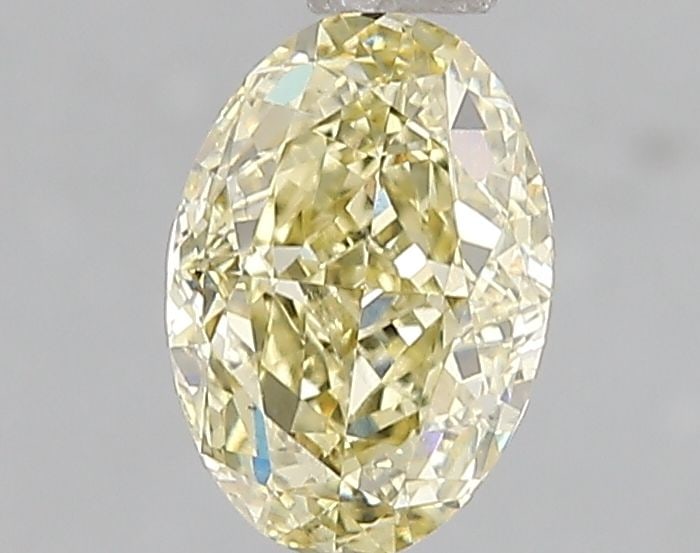 Loose Diamond - OVAL 1.07ct Fancy Yellow VS2: Loose Diamond - OVAL 1.07ct Fancy Yellow VS2 Source: This is a real non-mined Diamond that has been grown in a lab Shape: OVAL Carats: 1.07 Color: Fancy Yellow Certification: IGI Video: