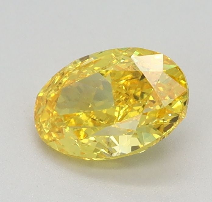 Loose Diamond - OVAL 0.62ct Fancy Vivid Yellow VS1: Loose Diamond - OVAL 0.62ct Fancy Vivid Yellow VS1 Source: This is a real non-mined Diamond that has been grown in a lab Shape: OVAL Carats: 0.62 Color: Fancy Vivid Yellow Certification: IGI Video: