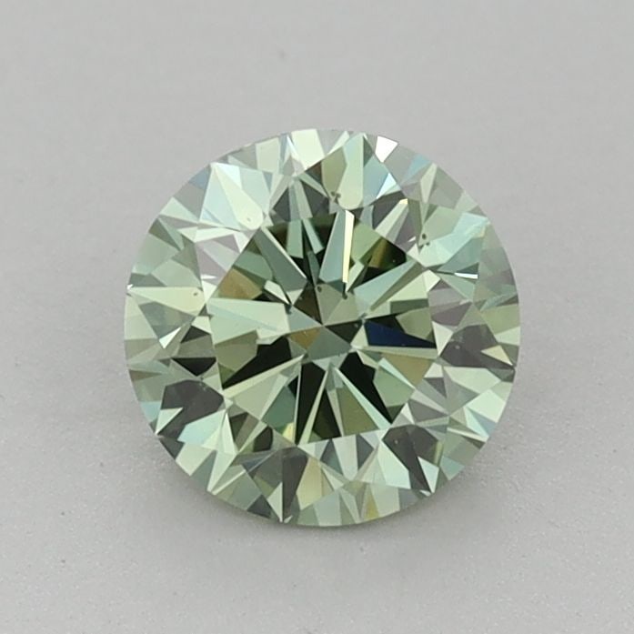 Loose Diamond - ROUND 0.9ct Fancy Vivid Green VS2: Loose Diamond - ROUND 0.9ct Fancy Vivid Green VS2 Source: This is a real non-mined Diamond that has been grown in a lab Shape: ROUND Carats: 0.9 Color: Fancy Vivid Green Certification: IGI Video: