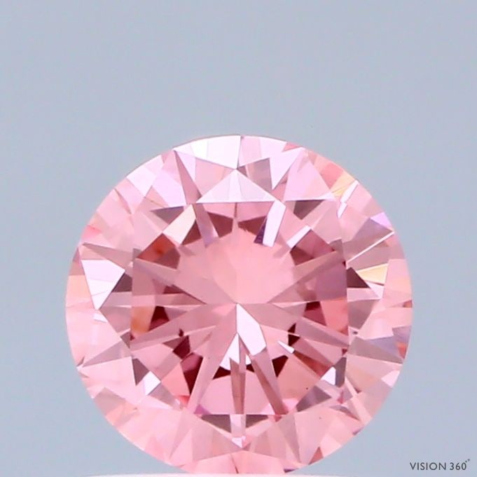 Loose Diamond - ROUND 0.69ct Fancy Vivid Pink VS1: Loose Diamond - ROUND 0.69ct Fancy Vivid Pink VS1 Source: This is a real non-mined Diamond that has been grown in a lab Shape: ROUND Carats: 0.69 Color: Fancy Vivid Pink Certification: IGI Video: