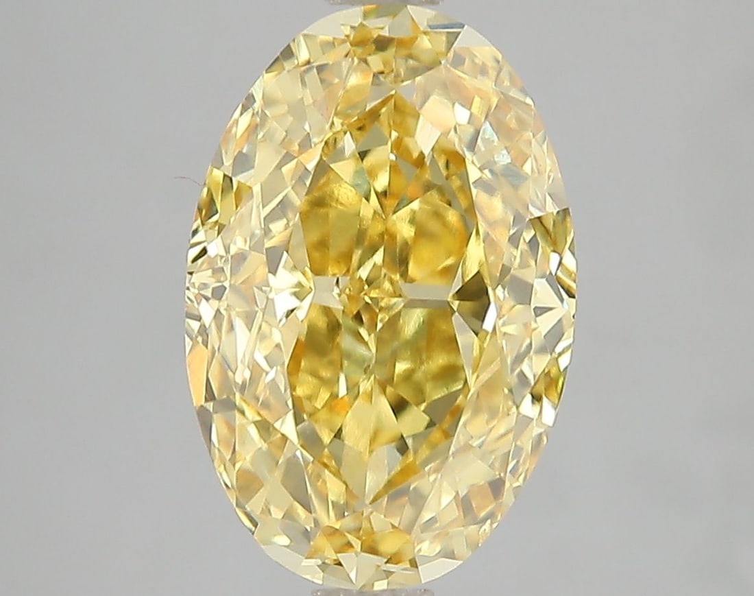 Loose Diamond - OVAL 5.02ct Fancy Vivid Yellow VS2: Loose Diamond - OVAL 5.02ct Fancy Vivid Yellow VS2 Source: This is a real non-mined Diamond that has been grown in a lab Shape: OVAL Carats: 5.02 Color: Fancy Vivid Yellow Certification: IGI Video: