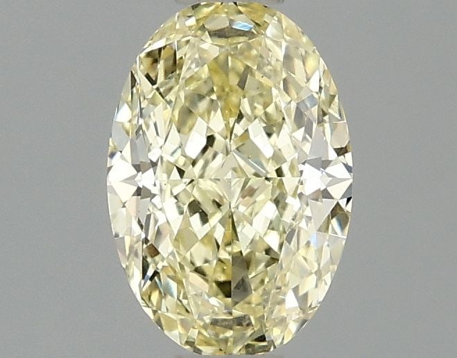 Loose Diamond - OVAL 1.1ct Fancy Yellow VS1: Loose Diamond - OVAL 1.1ct Fancy Yellow VS1 Source: This is a real non-mined Diamond that has been grown in a lab Shape: OVAL Carats: 1.1 Color: Fancy Yellow Certification: IGI Video: