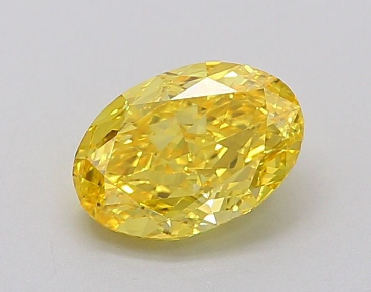 Loose Diamond - OVAL 0.91ct Fancy Vivid Yellow VVS1: Loose Diamond - OVAL 0.91ct Fancy Vivid Yellow VVS1 Source: This is a real non-mined Diamond that has been grown in a lab Shape: OVAL Carats: 0.91 Color: Fancy Vivid Yellow Certification: IGI Video: