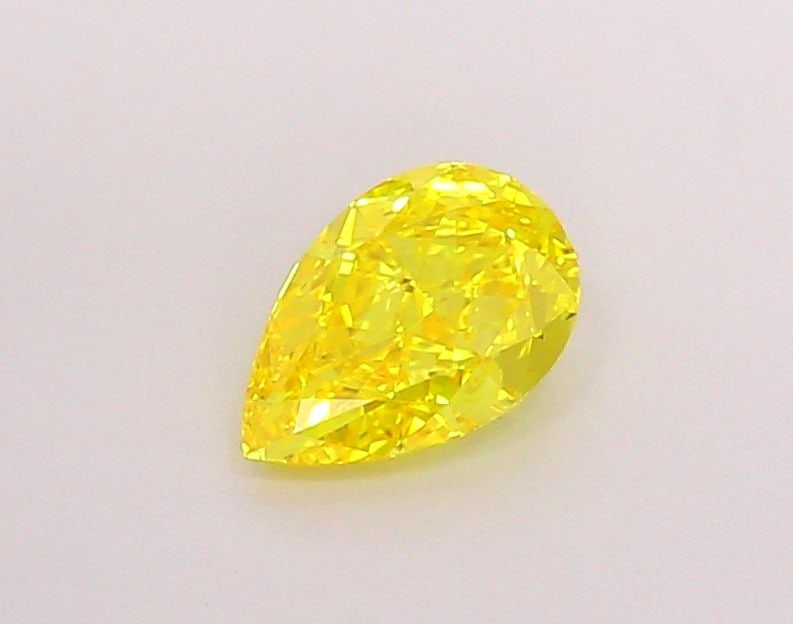 Loose Diamond - PEAR 1.02ct Fancy Vivid Yellow IF: Loose Diamond - PEAR 1.02ct Fancy Vivid Yellow IF Source: This is a real non-mined Diamond that has been grown in a lab Shape: PEAR Carats: 1.02 Color: Fancy Vivid Yellow Certification: IGI Video: