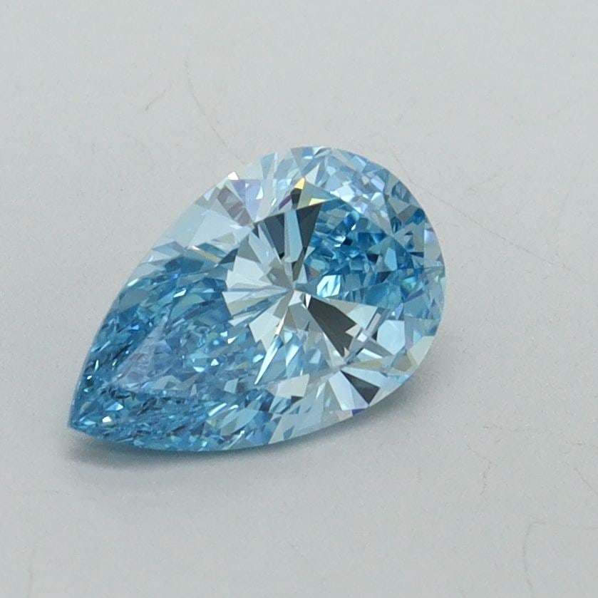 Loose Diamond - PEAR 0.8ct Fancy Vivid Blue VVS2: Loose Diamond - PEAR 0.8ct Fancy Vivid Blue VVS2 Source: This is a real non-mined Diamond that has been grown in a lab Shape: PEAR Carats: 0.8 Color: Fancy Vivid Blue Certification: IGI Video: