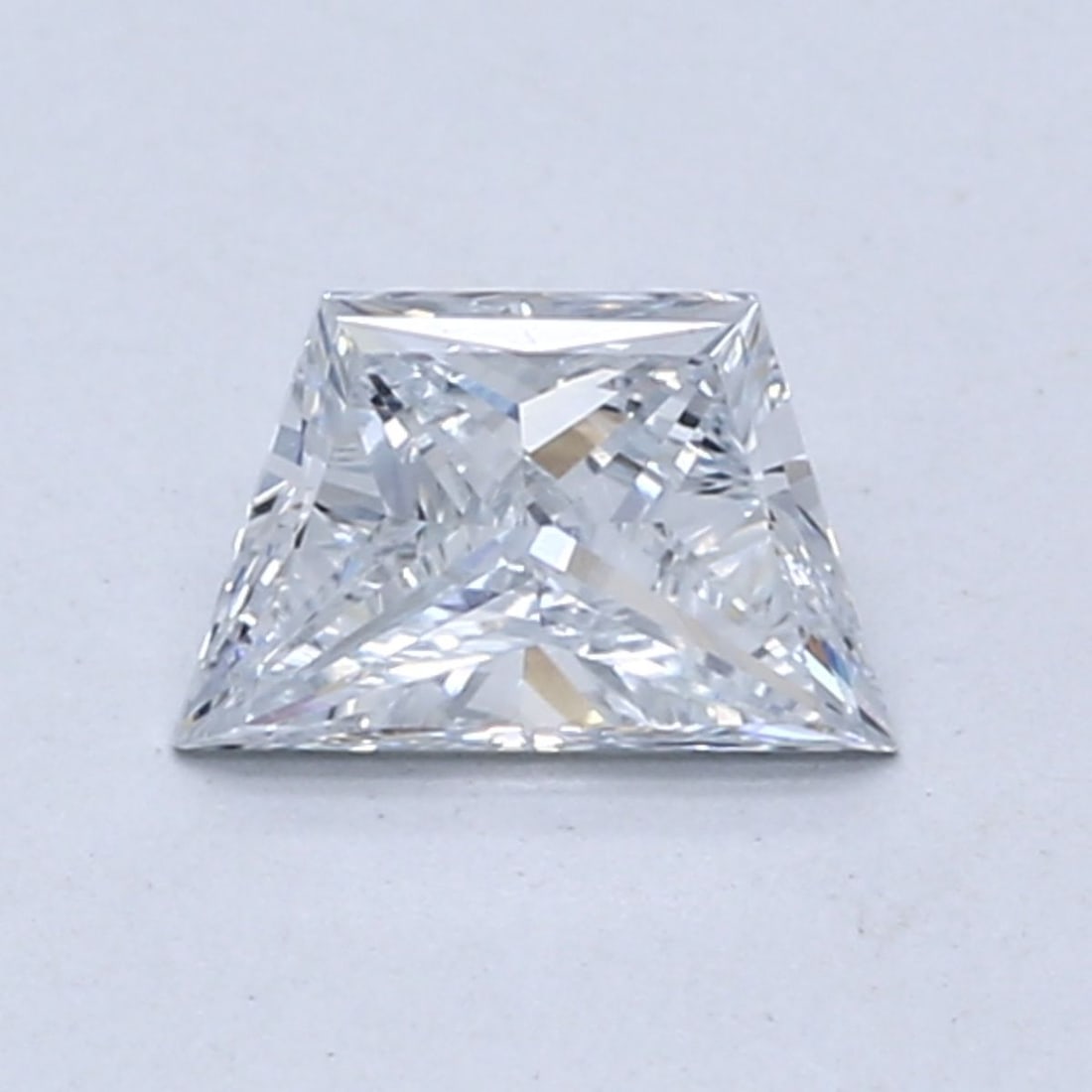 Loose Diamond - TRAPEZOID 0.64ct Light Blue VS1: Loose Diamond - TRAPEZOID 0.64ct Light Blue VS1 Source: This is a real non-mined Diamond that has been grown in a lab Shape: TRAPEZOID Carats: 0.64 Color: Light Blue Certification: NONE Video: