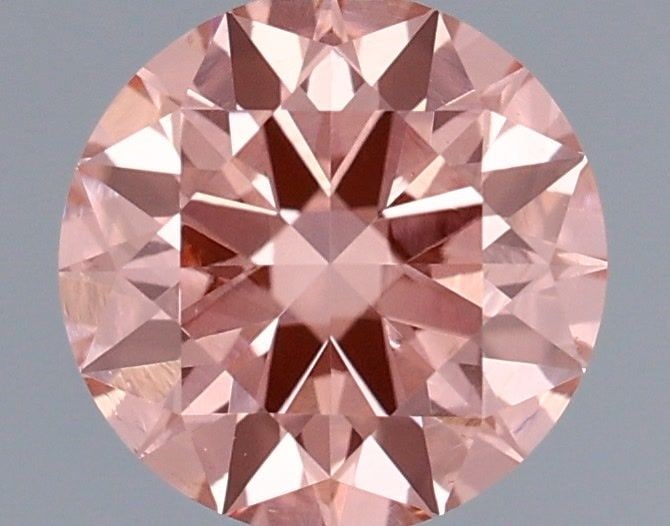Ideal Loose Diamond - ROUND 0.42ct Fancy Vivid Pink VVS2: Ideal Loose Diamond - ROUND 0.42ct Fancy Vivid Pink VVS2 Source: This is a real non-mined Diamond that has been grown in a lab Shape: ROUND Carats: 0.42 Color: Fancy Vivid Pink Certification: IGI Vide