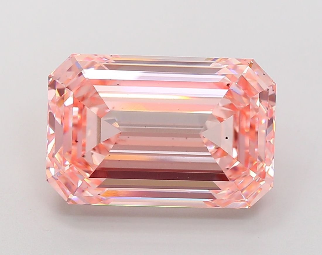 Loose Diamond - EMERALD 14.05ct Fancy Vivid Pink VS2: Loose Diamond - EMERALD 14.05ct Fancy Vivid Pink VS2 Source: This is a real non-mined Diamond that has been grown in a lab Shape: EMERALD Carats: 14.05 Color: Fancy Vivid Pink Certification: IGI Video