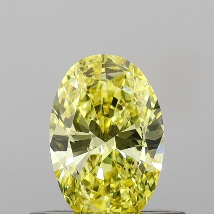 Loose Diamond - OVAL 0.48ct Fancy Vivid Yellow VS2: Loose Diamond - OVAL 0.48ct Fancy Vivid Yellow VS2 Source: This is a real non-mined Diamond that has been grown in a lab Shape: OVAL Carats: 0.48 Color: Fancy Vivid Yellow Certification: IGI Video: