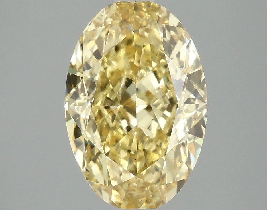 Loose Diamond - OVAL 3.02ct Fancy Vivid Yellow VS1: Loose Diamond - OVAL 3.02ct Fancy Vivid Yellow VS1 Source: This is a real non-mined Diamond that has been grown in a lab Shape: OVAL Carats: 3.02 Color: Fancy Vivid Yellow Certification: IGI Video: