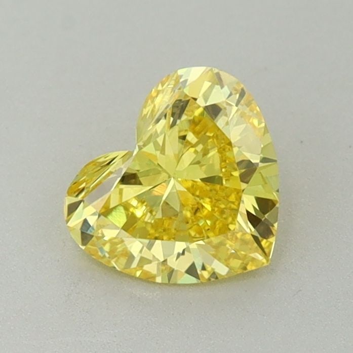 Loose Diamond - HEART 0.67ct Fancy Vivid Yellow VS1: Loose Diamond - HEART 0.67ct Fancy Vivid Yellow VS1 Source: This is a real non-mined Diamond that has been grown in a lab Shape: HEART Carats: 0.67 Color: Fancy Vivid Yellow Certification: IGI Video: