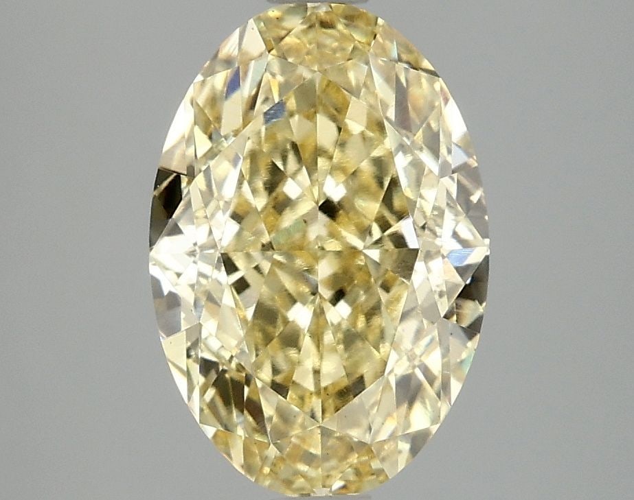 Loose Diamond - OVAL 3.1ct Fancy Vivid Yellow VS2: Loose Diamond - OVAL 3.1ct Fancy Vivid Yellow VS2 Source: This is a real non-mined Diamond that has been grown in a lab Shape: OVAL Carats: 3.1 Color: Fancy Vivid Yellow Certification: IGI Video: