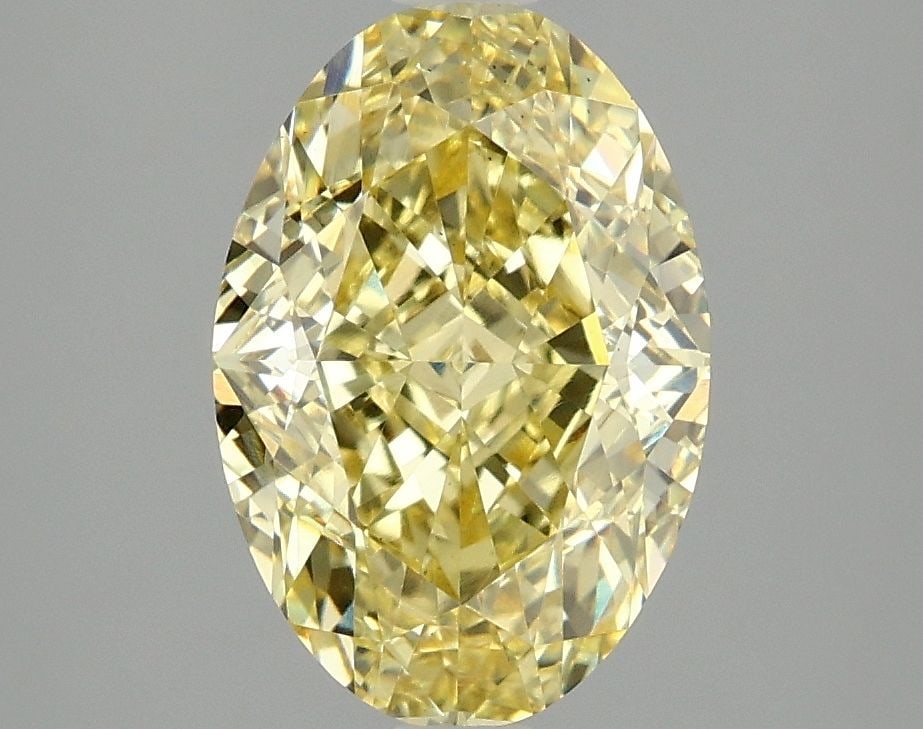 Loose Diamond - OVAL 3.04ct Fancy Vivid Yellow VS2: Loose Diamond - OVAL 3.04ct Fancy Vivid Yellow VS2 Source: This is a real non-mined Diamond that has been grown in a lab Shape: OVAL Carats: 3.04 Color: Fancy Vivid Yellow Certification: IGI Video: