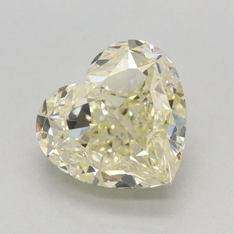 Loose Diamond - HEART 1.2ct Fancy Light Yellow VS1: Loose Diamond - HEART 1.2ct Fancy Light Yellow VS1 Source: This is a real non-mined Diamond that has been grown in a lab Shape: HEART Carats: 1.2 Color: Fancy Light Yellow Certification: IGI Video: