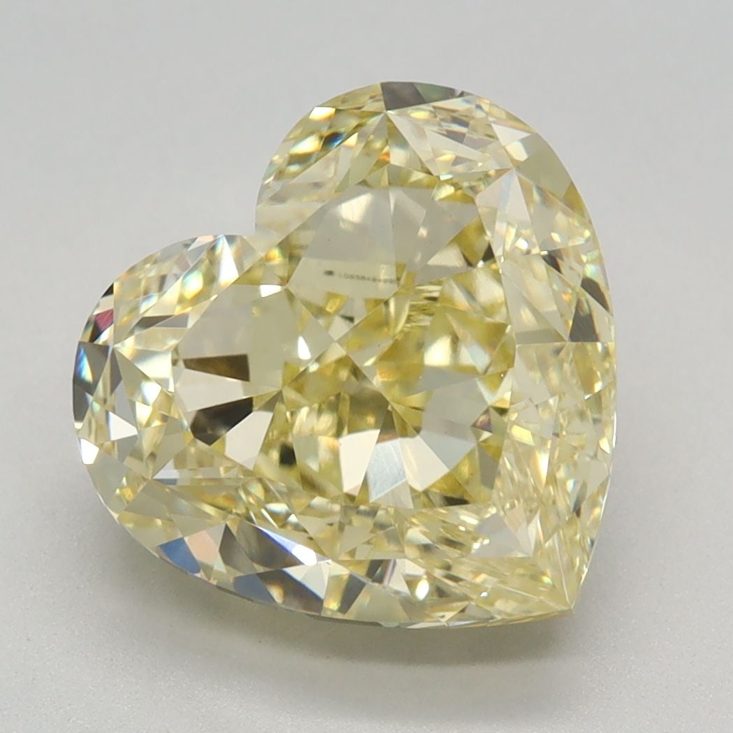 Loose Diamond - HEART 4.12ct Fancy Intense Yellow VVS2: Loose Diamond - HEART 4.12ct Fancy Intense Yellow VVS2 Source: This is a real non-mined Diamond that has been grown in a lab Shape: HEART Carats: 4.12 Color: Fancy Intense Yellow Certification: IGI Vi