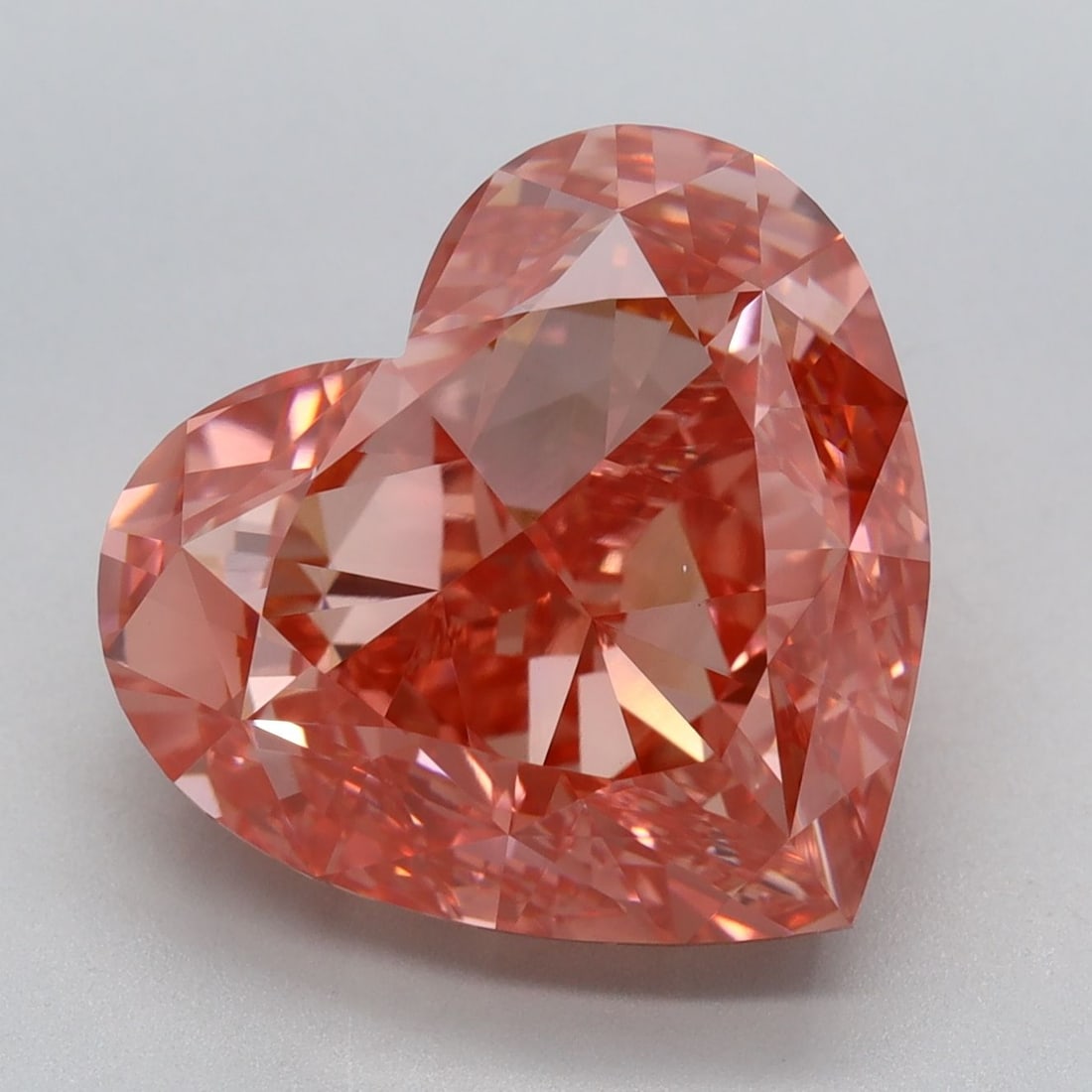 Loose Diamond - HEART 7.68ct Fancy Vivid Pink VVS2: Loose Diamond - HEART 7.68ct Fancy Vivid Pink VVS2 Source: This is a real non-mined Diamond that has been grown in a lab Shape: HEART Carats: 7.68 Color: Fancy Vivid Pink Certification: IGI Video:
