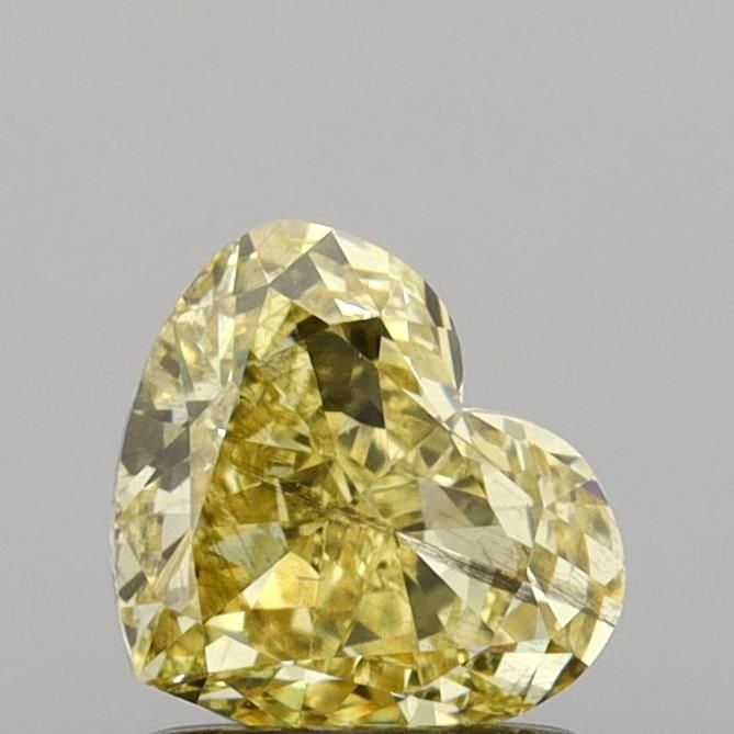 Loose Diamond - HEART 1.01ct Fancy Intense Yellow SI2: Loose Diamond - HEART 1.01ct Fancy Intense Yellow SI2 Source: This is a real non-mined Diamond that has been grown in a lab Shape: HEART Carats: 1.01 Color: Fancy Intense Yellow Certification: IGI Vid