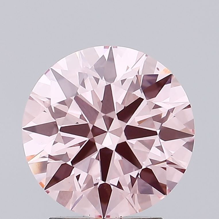 Ideal Loose Diamond - ROUND 2.21ct Fancy Vivid Pink VS1: Ideal Loose Diamond - ROUND 2.21ct Fancy Vivid Pink VS1 Source: This is a real non-mined Diamond that has been grown in a lab Shape: ROUND Carats: 2.21 Color: Fancy Vivid Pink Certification: IGI