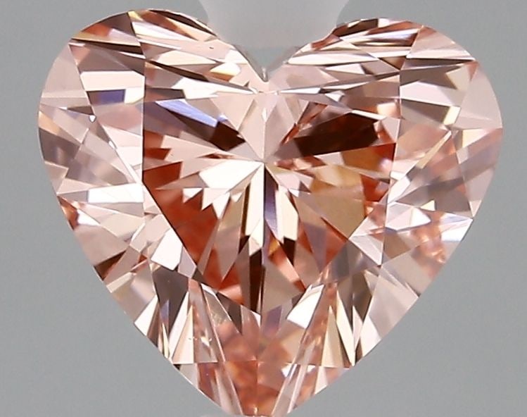 Loose Diamond - HEART 1.68ct Fancy Vivid Pink VVS2: Loose Diamond - HEART 1.68ct Fancy Vivid Pink VVS2 Source: This is a real non-mined Diamond that has been grown in a lab Shape: HEART Carats: 1.68 Color: Fancy Vivid Pink Certification: IGI Video: