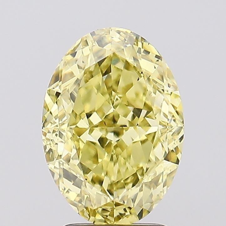 Loose Diamond - OVAL 3.35ct Fancy Vivid Yellow VS1: Loose Diamond - OVAL 3.35ct Fancy Vivid Yellow VS1 Source: This is a real non-mined Diamond that has been grown in a lab Shape: OVAL Carats: 3.35 Color: Fancy Vivid Yellow Certification: IGI Video: