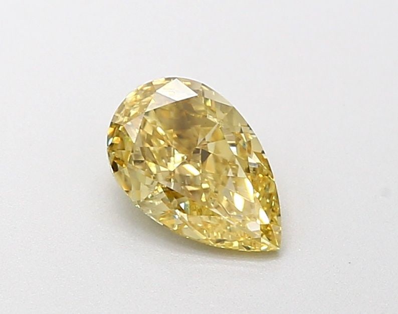 Loose Diamond - PEAR 0.79ct Fancy Intense Yellow VS1: Loose Diamond - PEAR 0.79ct Fancy Intense Yellow VS1 Source: This is a real non-mined Diamond that has been grown in a lab Shape: PEAR Carats: 0.79 Color: Fancy Intense Yellow Certification: IGI Video