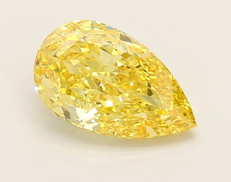 Loose Diamond - PEAR 1.21ct Fancy Vivid Yellow VS1: Loose Diamond - PEAR 1.21ct Fancy Vivid Yellow VS1 Source: This is a real non-mined Diamond that has been grown in a lab Shape: PEAR Carats: 1.21 Color: Fancy Vivid Yellow Certification: IGI Video: