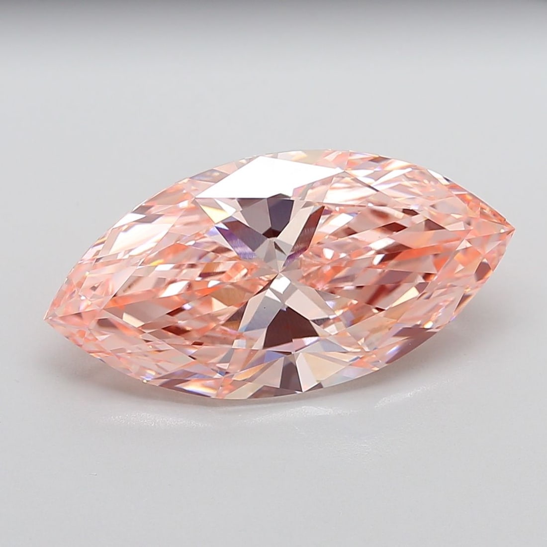 Loose Diamond - MARQUISE 10.07ct Fancy Vivid Pink VVS2: Loose Diamond - MARQUISE 10.07ct Fancy Vivid Pink VVS2 Source: This is a real non-mined Diamond that has been grown in a lab Shape: MARQUISE Carats: 10.07 Color: Fancy Vivid Pink Certification: IGI Vi