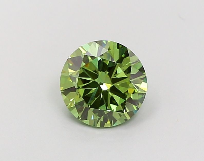 Loose Diamond - ROUND 1.48ct Fancy Vivid Green VS2: Loose Diamond - ROUND 1.48ct Fancy Vivid Green VS2 Source: This is a real non-mined Diamond that has been grown in a lab Shape: ROUND Carats: 1.48 Color: Fancy Vivid Green Certification: IGI Video: