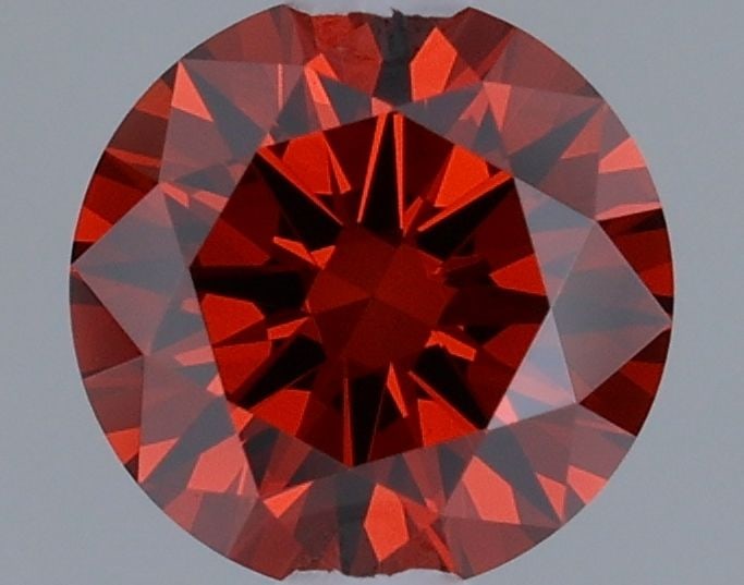 Loose Diamond - ROUND 0.32ct Fancy Vivid Reddish Orange VVS1: Loose Diamond - ROUND 0.32ct Fancy Vivid Reddish Orange VVS1 Source: This is a real non-mined Diamond that has been grown in a lab Shape: ROUND Carats: 0.32 Color: Fancy Vivid Reddish Orange Certifica