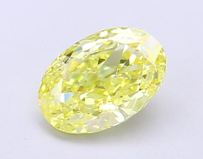 Loose Diamond - OVAL 1.01ct Fancy Vivid Yellow VVS2: Loose Diamond - OVAL 1.01ct Fancy Vivid Yellow VVS2 Source: This is a real non-mined Diamond that has been grown in a lab Shape: OVAL Carats: 1.01 Color: Fancy Vivid Yellow Certification: IGI Video: