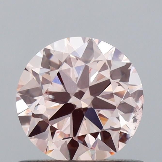Loose Diamond - ROUND 0.7ct Fancy Pink SI2: Loose Diamond - ROUND 0.7ct Fancy Pink SI2 Source: This is a real non-mined Diamond that has been grown in a lab Shape: ROUND Carats: 0.7 Color: Fancy Pink Certification: IGI Video: