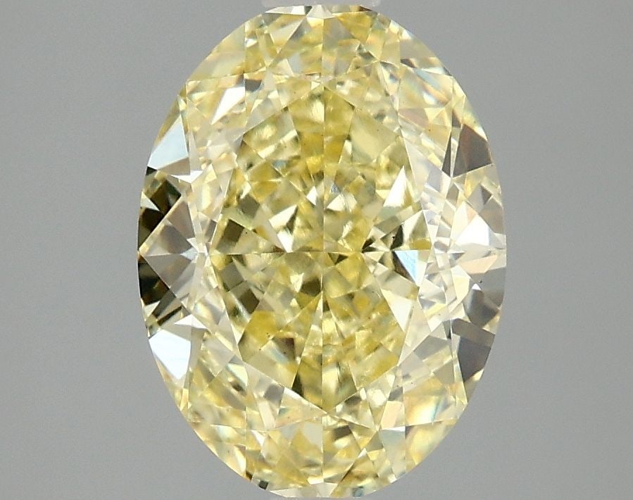 Loose Diamond - OVAL 3.07ct Fancy Vivid Yellow VS1: Loose Diamond - OVAL 3.07ct Fancy Vivid Yellow VS1 Source: This is a real non-mined Diamond that has been grown in a lab Shape: OVAL Carats: 3.07 Color: Fancy Vivid Yellow Certification: IGI Video:
