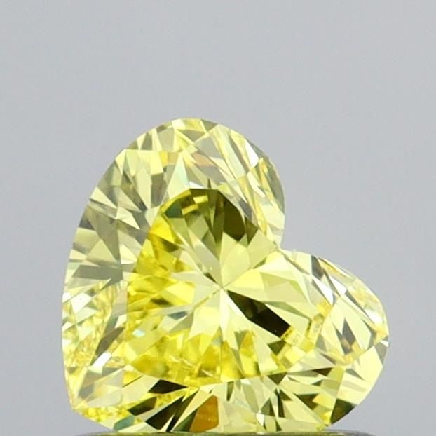Loose Diamond - HEART 0.62ct Fancy Vivid Yellow VS2: Loose Diamond - HEART 0.62ct Fancy Vivid Yellow VS2 Source: This is a real non-mined Diamond that has been grown in a lab Shape: HEART Carats: 0.62 Color: Fancy Vivid Yellow Certification: IGI