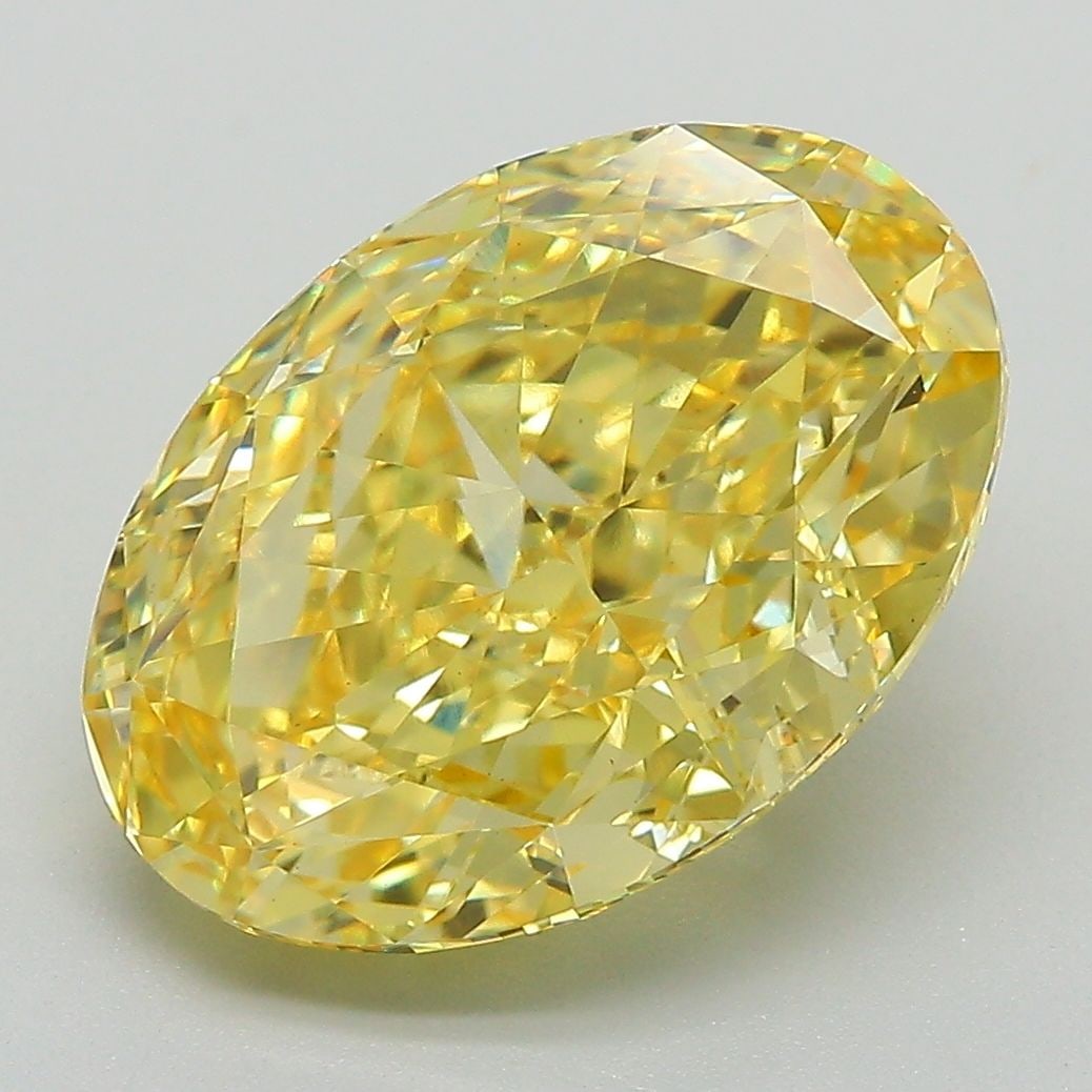 Loose Diamond - OVAL 6.24ct Fancy Vivid Yellow VS1: Loose Diamond - OVAL 6.24ct Fancy Vivid Yellow VS1 Source: This is a real non-mined Diamond that has been grown in a lab Shape: OVAL Carats: 6.24 Color: Fancy Vivid Yellow Certification: IGI Video: