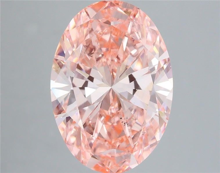 Loose Diamond - OVAL 6.09ct Fancy Vivid Pink VS2: Loose Diamond - OVAL 6.09ct Fancy Vivid Pink VS2 Source: This is a real non-mined Diamond that has been grown in a lab Shape: OVAL Carats: 6.09 Color: Fancy Vivid Pink Certification: IGI Video: