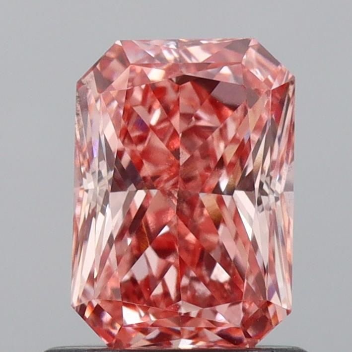 Loose Diamond - RADIANT 0.97ct Fancy Vivid Pink VS2: Loose Diamond - RADIANT 0.97ct Fancy Vivid Pink VS2 Source: This is a real non-mined Diamond that has been grown in a lab Shape: RADIANT Carats: 0.97 Color: Fancy Vivid Pink Certification: IGI Video: