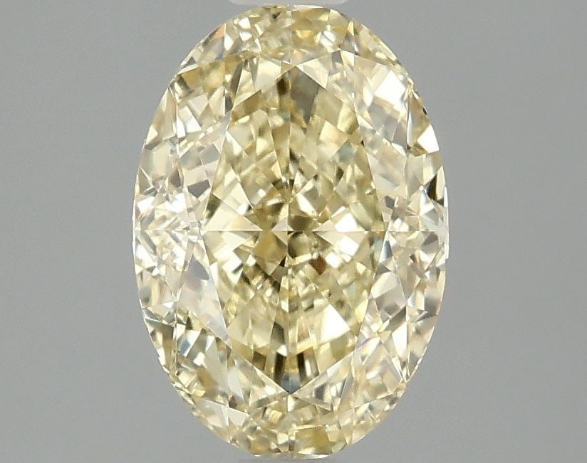 Loose Diamond - OVAL 2.08ct Fancy Vivid Yellow VS1: Loose Diamond - OVAL 2.08ct Fancy Vivid Yellow VS1 Source: This is a real non-mined Diamond that has been grown in a lab Shape: OVAL Carats: 2.08 Color: Fancy Vivid Yellow Certification: IGI Video: