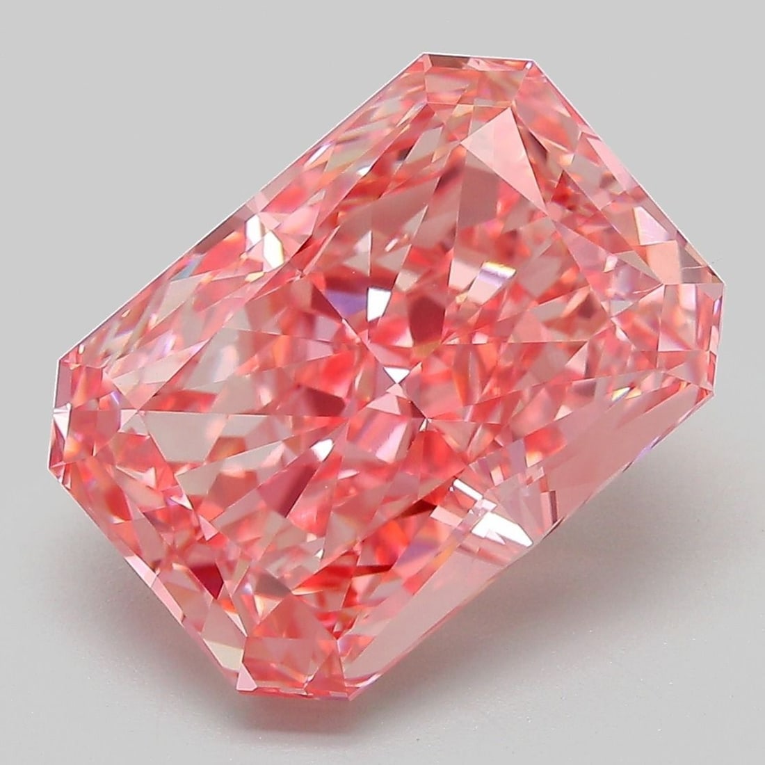 Loose Diamond - RADIANT 7.24ct Fancy Vivid Orangey Pink VVS2: Loose Diamond - RADIANT 7.24ct Fancy Vivid Orangey Pink VVS2 Source: This is a real non-mined Diamond that has been grown in a lab Shape: RADIANT Carats: 7.24 Color: Fancy Vivid Orangey Pink Certifica