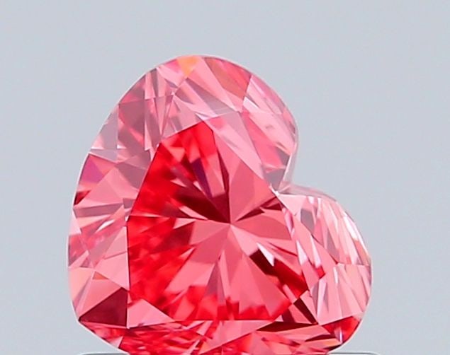 Loose Diamond - HEART 0.83ct Fancy Vivid Pink VS1: Loose Diamond - HEART 0.83ct Fancy Vivid Pink VS1 Source: This is a real non-mined Diamond that has been grown in a lab Shape: HEART Carats: 0.83 Color: Fancy Vivid Pink Certification: IGI Video: