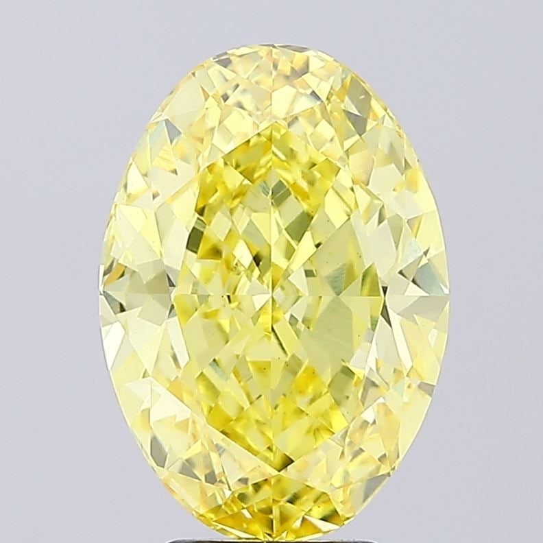 Loose Diamond - OVAL 6.0ct Fancy Vivid Yellow VS2: Loose Diamond - OVAL 6.0ct Fancy Vivid Yellow VS2 Source: This is a real non-mined Diamond that has been grown in a lab Shape: OVAL Carats: 6.0 Color: Fancy Vivid Yellow Certification: IGI Video: